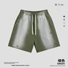 pantalones cortos verdes