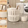 One large and one small laundry basket, milky white