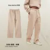 กางเกงจ็อกเกอร์แอปริคอทสีเทา