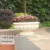 Grande vaso da fiori a forma di zucca