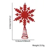 Stella superiore dell'albero del fiocco di neve del sole rosso