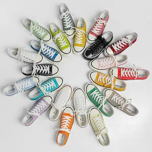 Wholesale Low Cut Walking Style Flat White Casual Canvas Skateboarding Shoes for Men Women Unisex Student