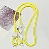 Yellow rope with white knot