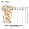 piques de bambou aux fleurs sauvages