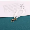 6 fish-shaped buckles
