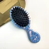 Dientes de peine con cerdas de jabalí azul
