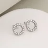 Steel and white rhinestone earrings