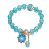 Bracciale piccolo con margherite - azzurro