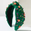 Vert avec perle orange