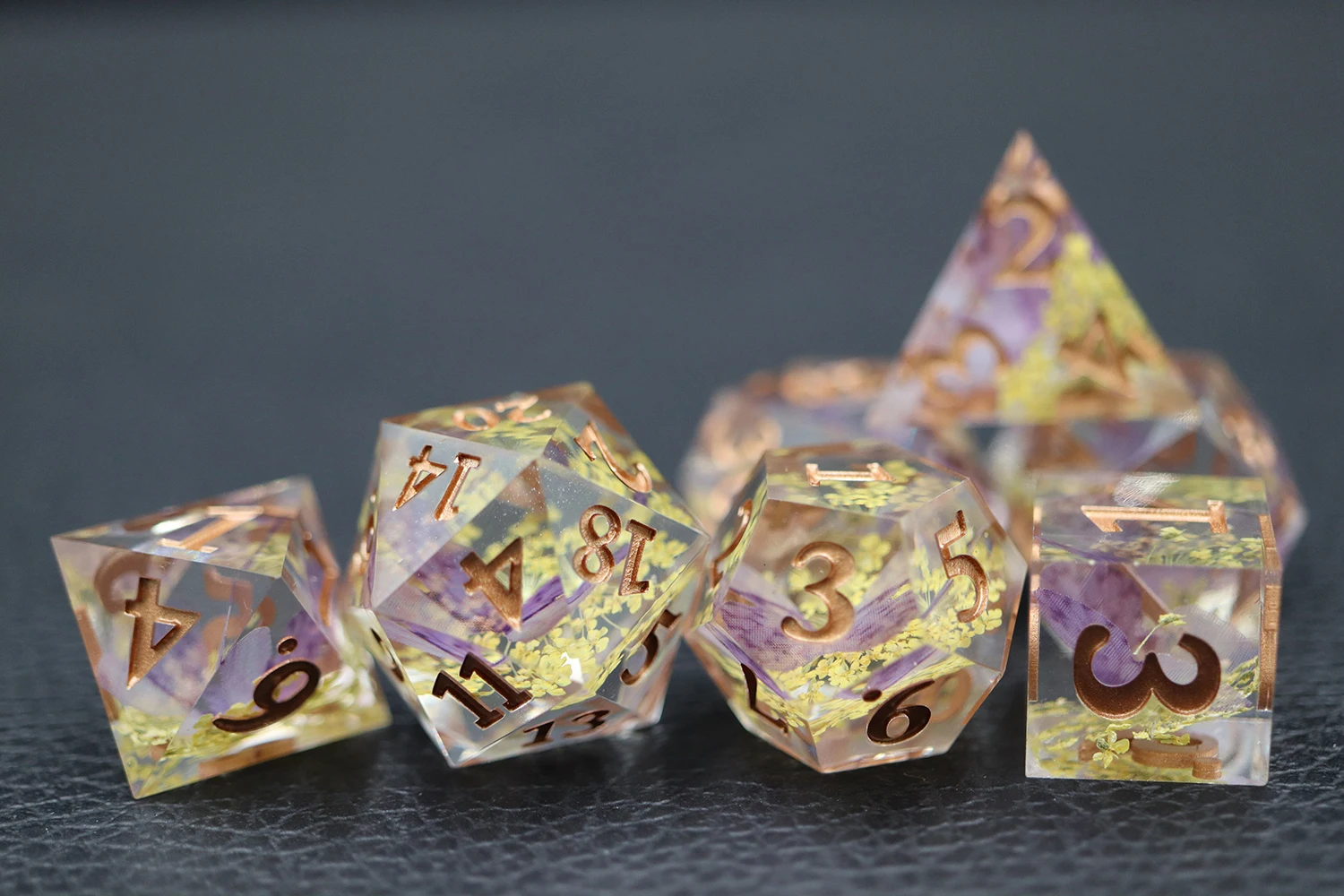 Hot Selling Custom D20 Dnd Dice Set 7pcs Transparent Liquid Core with Logo Resin Material Yellow Flower Design supplier