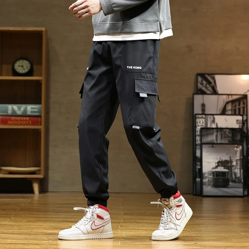Nuovi Uomini Tute Per Il Tempo Libero Grandi Cantieri Uomo Pantaloni  Sportivi Larghi Tasca Ornamento Collocazione Fascio Piede Bocca Pantaloni  Casual Da Uomo - Buy Pantaloni Con Tasca A Soffietto,Tasche Con Cerniera