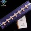 Bracelet croix en or rose