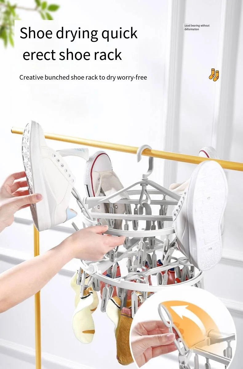 Multi-clip plastic coat hanger Multi-functional folding rotating underwear shoes multi-layer storage drying drying clothes rack supplier