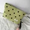 Green polo dot cosmetic bag