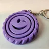 Juego de 3 llaveros con carita sonriente