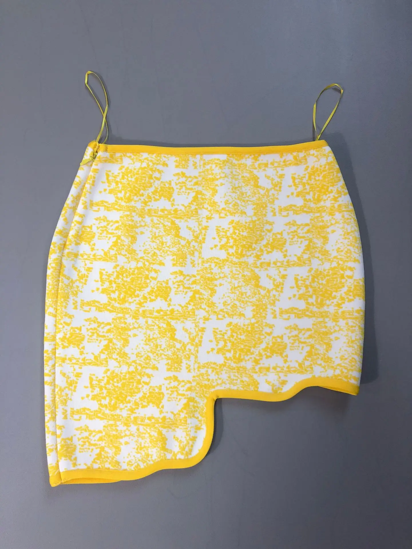 Asymmetric skirt hem detail
