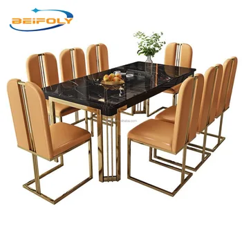 Luxury gold dinning table set 6 seater dining table chairs for villa