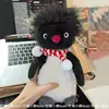 Pinguino con sciarpa