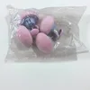 Pack de 4 unidades en color rosa con revestimiento de tela.
