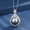 Gray bead pendant with cross chain