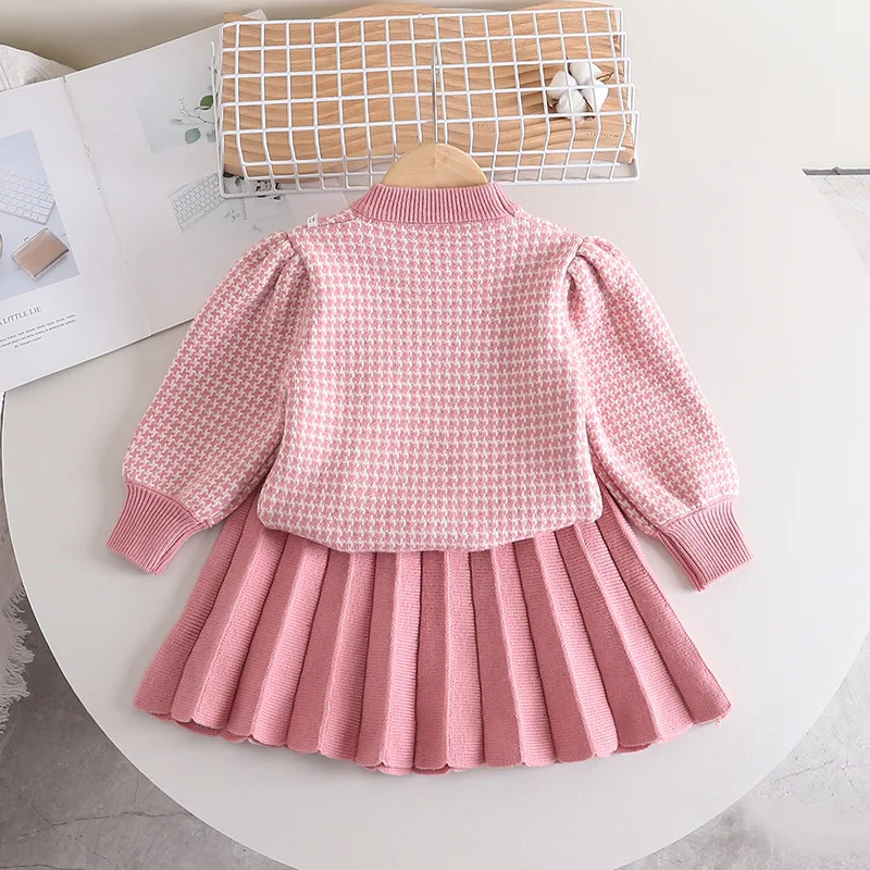 2023 Girls Designer New Solid Sweater Plaid Pleated Skirt Autumn Winter Bow Knitting Two Pieces Long Bubble Sleeves Kids Wear