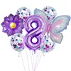 Conjunto de 8 mariposas rosas y moradas.