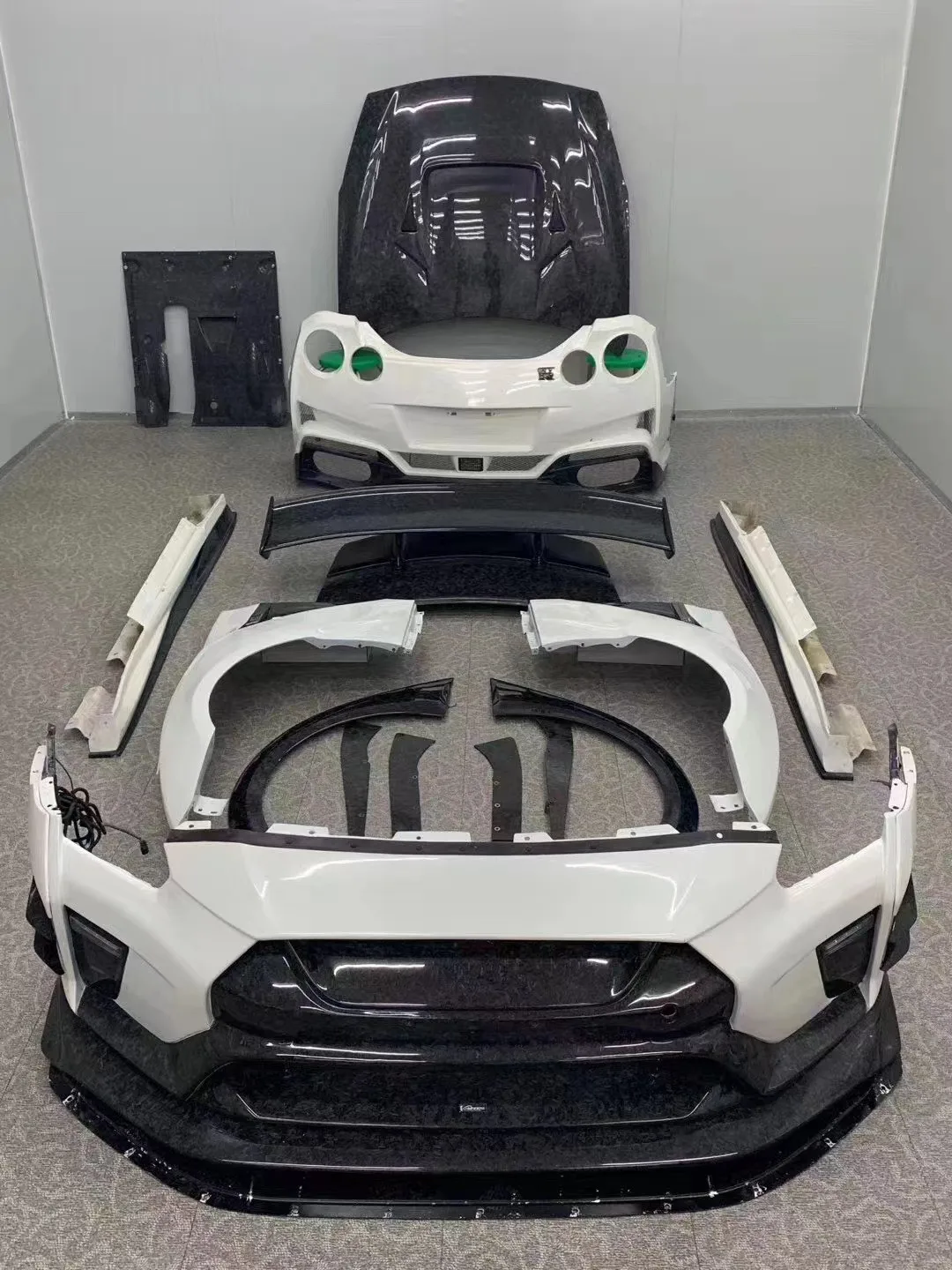 日产GTR R35车身套件GTR R35升级VARI风格碳纤维前后杆侧裙扰流板发动机罩| Alibaba.com