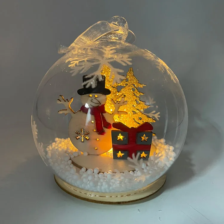 Wholesale personalized clear led light up hand blown glass hanging Christmas tree ball ornament with wooden decoration inside supplier