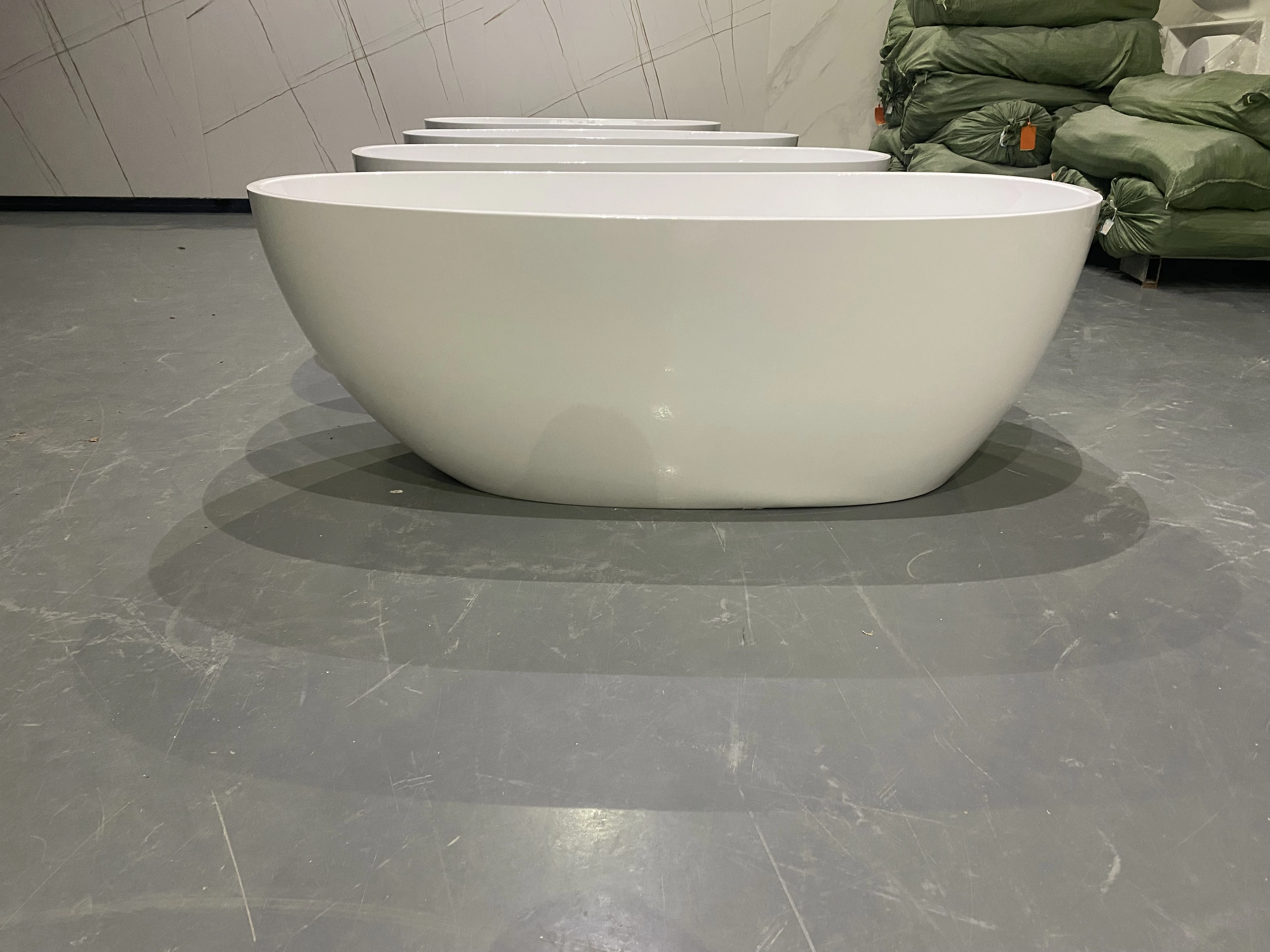 Promotion Competitive Price Direct Free Stand Tap Egg Shape Artificial Stone Tub Solid Surface Oval Bathtub Shape Tub for Sale