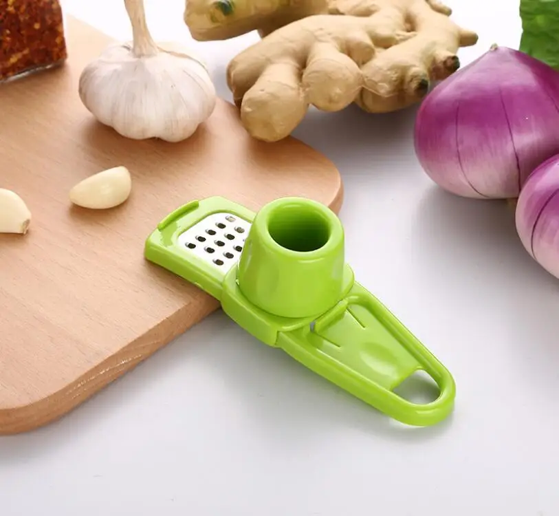 Creative Plastic kitchen gadgets wholesale cheese slicer multi kitchen grater ginger grater plastic garlic press