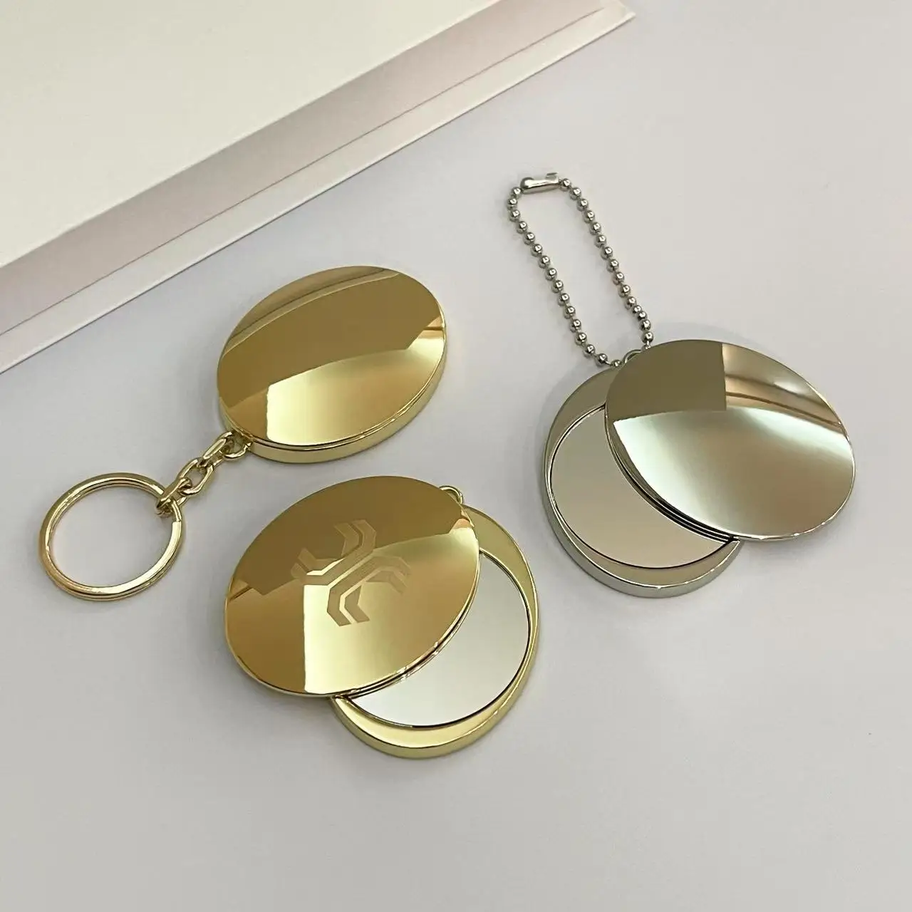 Custom Logo Mini Folding Mirror Portable Keychain For Women Travel Modern Style Small Promotional Gift Metal Crafts_voghion.com