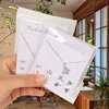 Ensemble boucles d'oreilles et collier