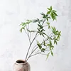 A green branch