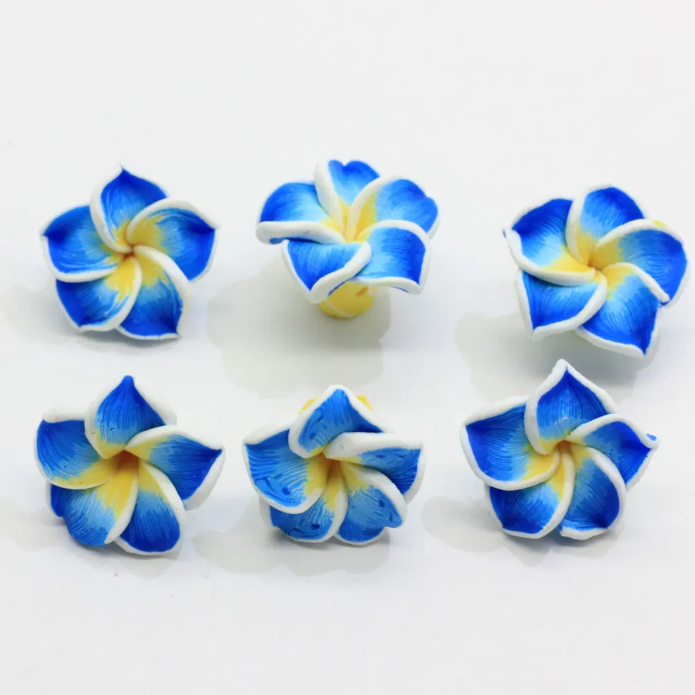 Perles de fleurs de frangipanier en argile polymère 52 mm - 1 pcs - France