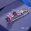 Purple flower brooch