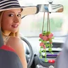Panier suspendu à fleurs roses à cinq pétales
