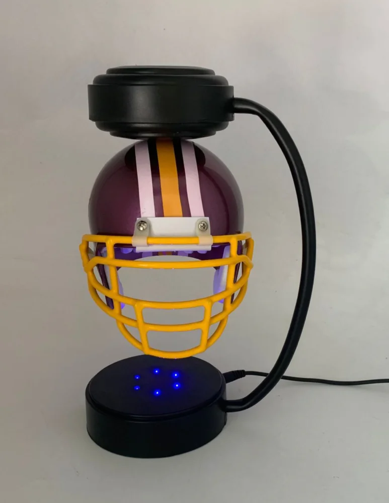 Source hotsale magnetic levitating football helmet , hover helmet display  racks on m.