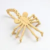 24cm bone-colored face-hugging insect