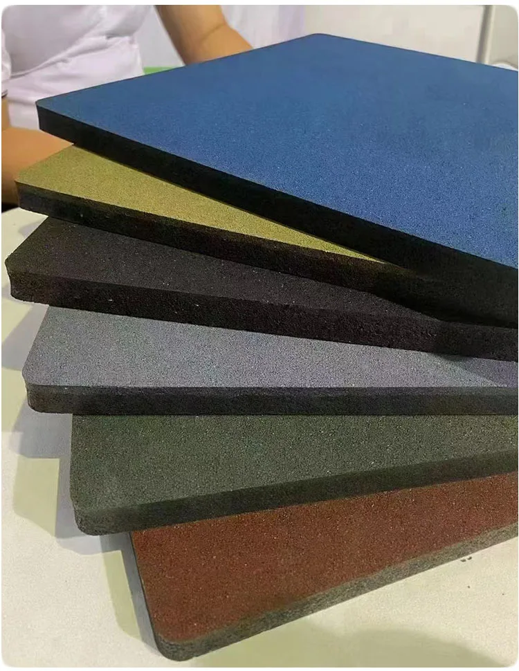 Rubber interlocking flooring tiles for playgrounds backyards and play