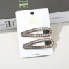 Conjunto de dos piezas con diamantes cuadrados y 6 gotas de champán