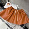 Falda naranja