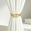 Gold diamond-encrusted belt buckle