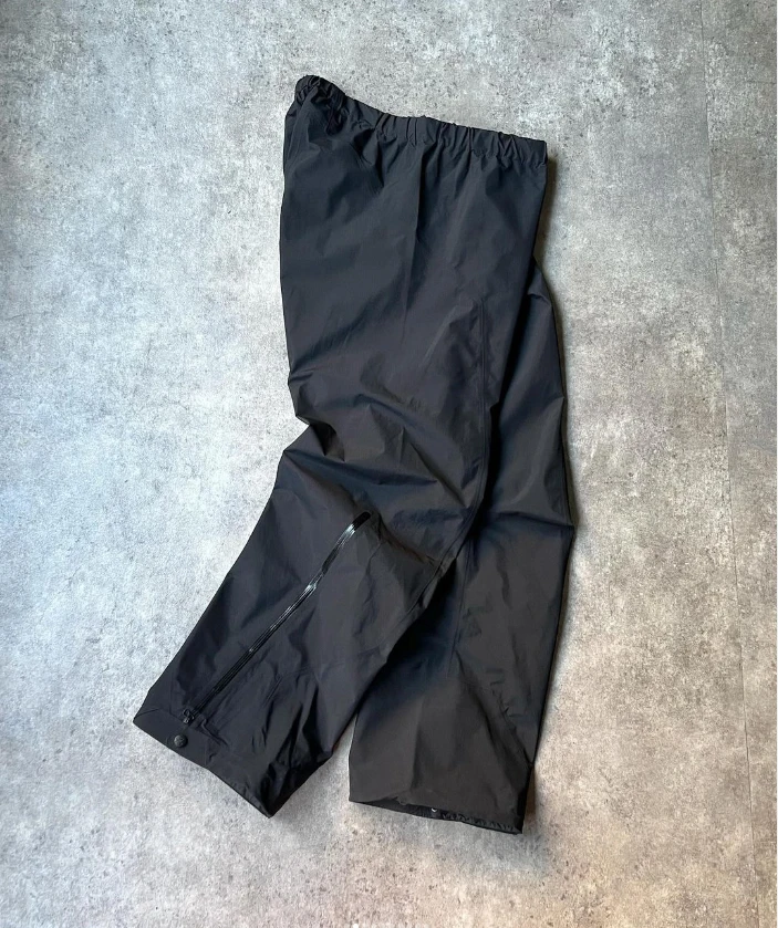 OEM Custom High Quality Man Black Loose Oversize Zipper Open Bottom Baggy Nylon Polyester Track Pants for Men supplier
