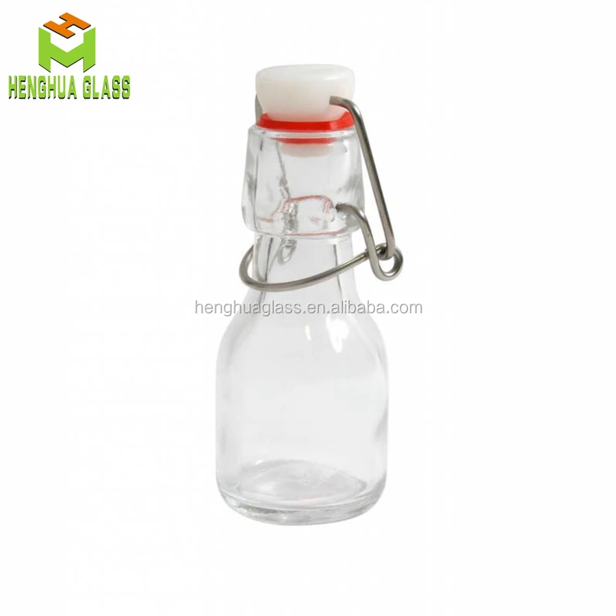 Small Mini 50ml 2oz Round Shape clear Drinks Swing Top Olive Oil Liquid Glass Container Bottle Wholesale