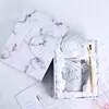 Caja de regalo individual para taza, de mármol gris.