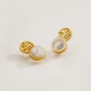 Golden "Fu" character earplugs