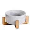 Gray ceramics with wooden frame