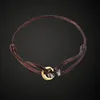Gold + steel (brown rope)