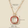 Collana in vetro con ciondolo a forma di mela rossa e chiusura - scatola vuota