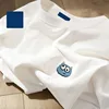 Cm-stemma sul petto-brutto mostro bianco